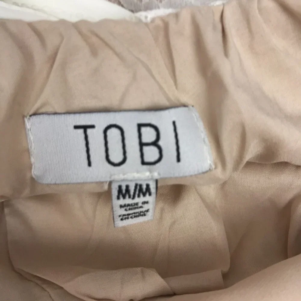 NWT TOBI White Embroidered Lace Romper Criss Cross Lace Up Shorts One Piece SZ M - Picture 9 of 9